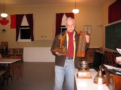 PKL Duncan MacIsaac with the District Best Road Sign, Best Runner-Up Club and Best Runner-Up President Trophies for 2006-2007