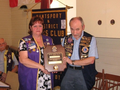 President Dallas Moore presenting Lion Ken MacKenzie with Melvin Jones Fellowship