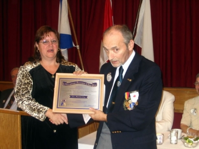 ZC Dallas Moore presents Lion Ken MacKenzie with Life Membership in the Hantsport & District Lions Club