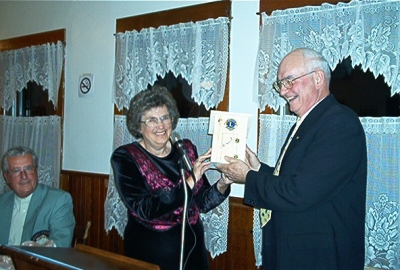 PDG Charles Uhlman, Guest Speaker 19th Charter Night presented with his own personal OUTHOUSE.