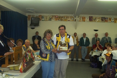 President Florence accepting Best Road Sign Trophy District 41N2 2001-2002 from PDG Peter Pilkington